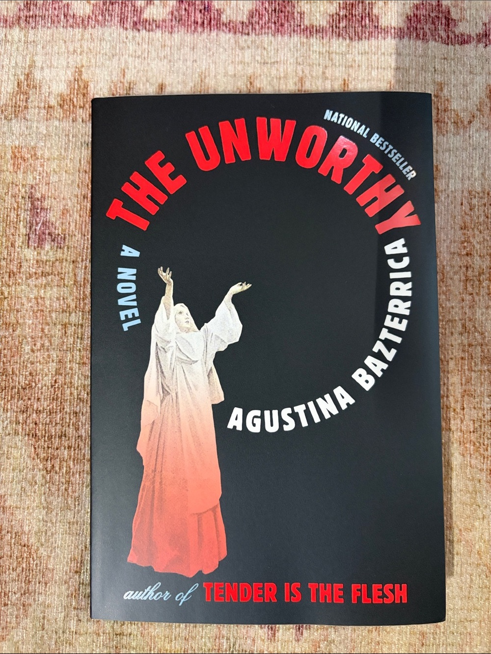 The Unworthy by Agustina Bazterrica - Black & Red Book